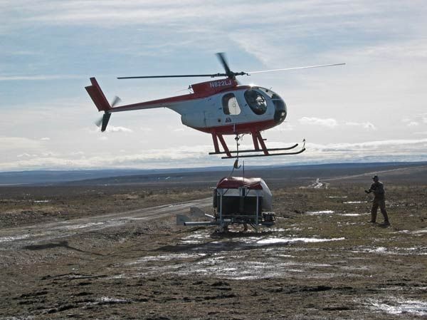 Helicopter reseeding the Murphy Complex fire area, Idaho