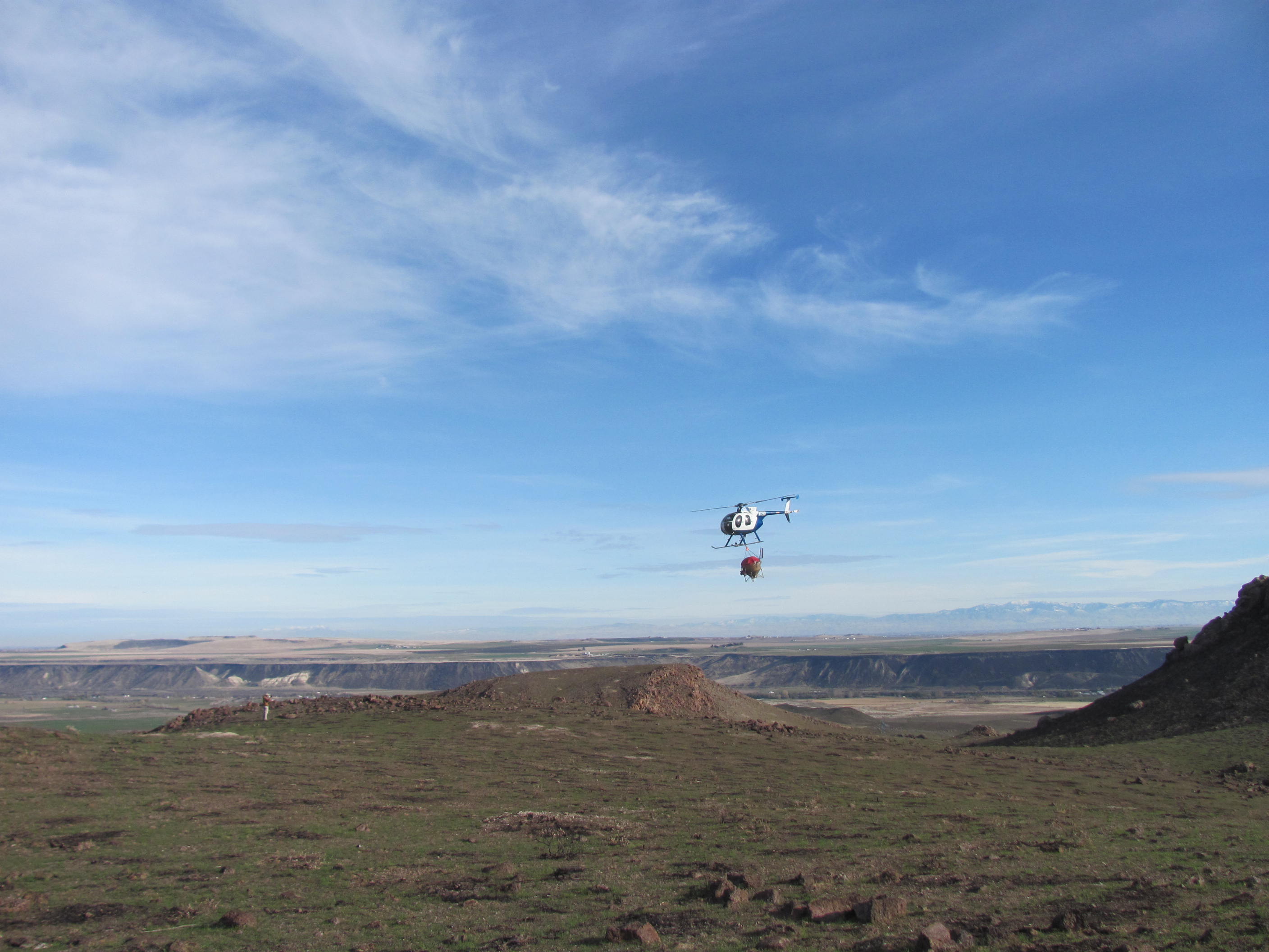 Helicopter reseeding the Soda Fire burn scar, Idaho